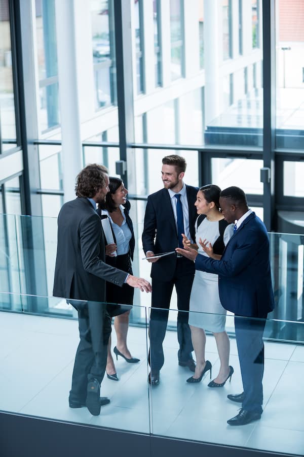 A team of business people talking in a modern building