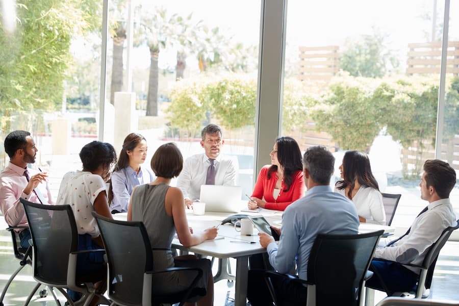 Business Team Meeting in Bright Modern Office